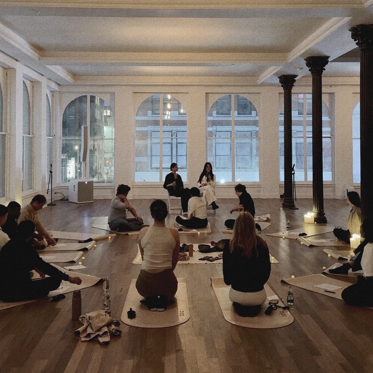 A group sound meditation session in a New York space